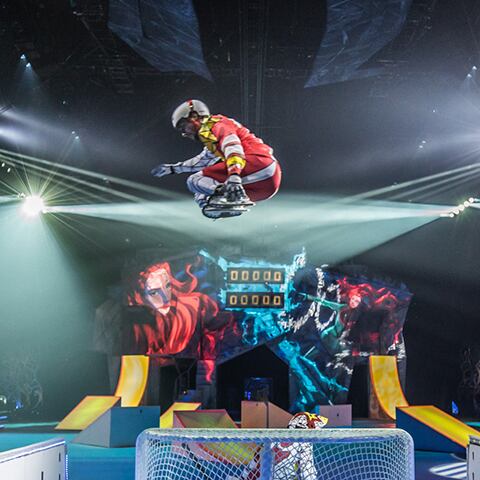 A skater performs a jump in the Playground act from the show Crystal 