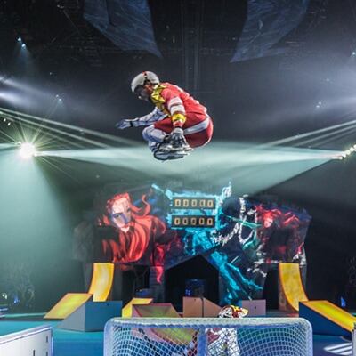 Hockey player jumps over a hockey net using ice ramps - cirque Crystal