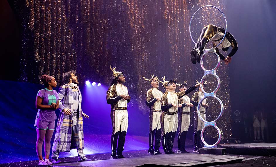 Performers dressed like Santa's reindeer achieve a hoop diving act - Twas The Night Cirque du Soleil Christmas 