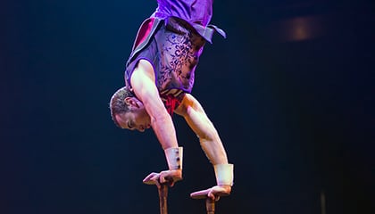 Acrobatic leader act from the show CORTEO by Cirque du Soleil